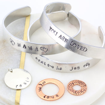 Jewelry cuff bracelets and pendants for optimization consultants.