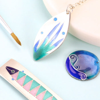 Hand-painted jewelry with fish designs for optimisation consultants.